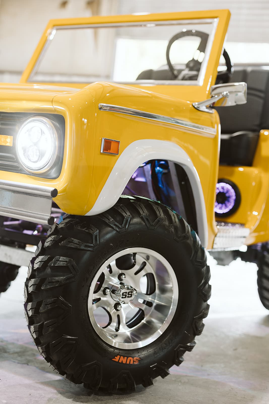 Yellow Retro Ride wheel and headlight detail
