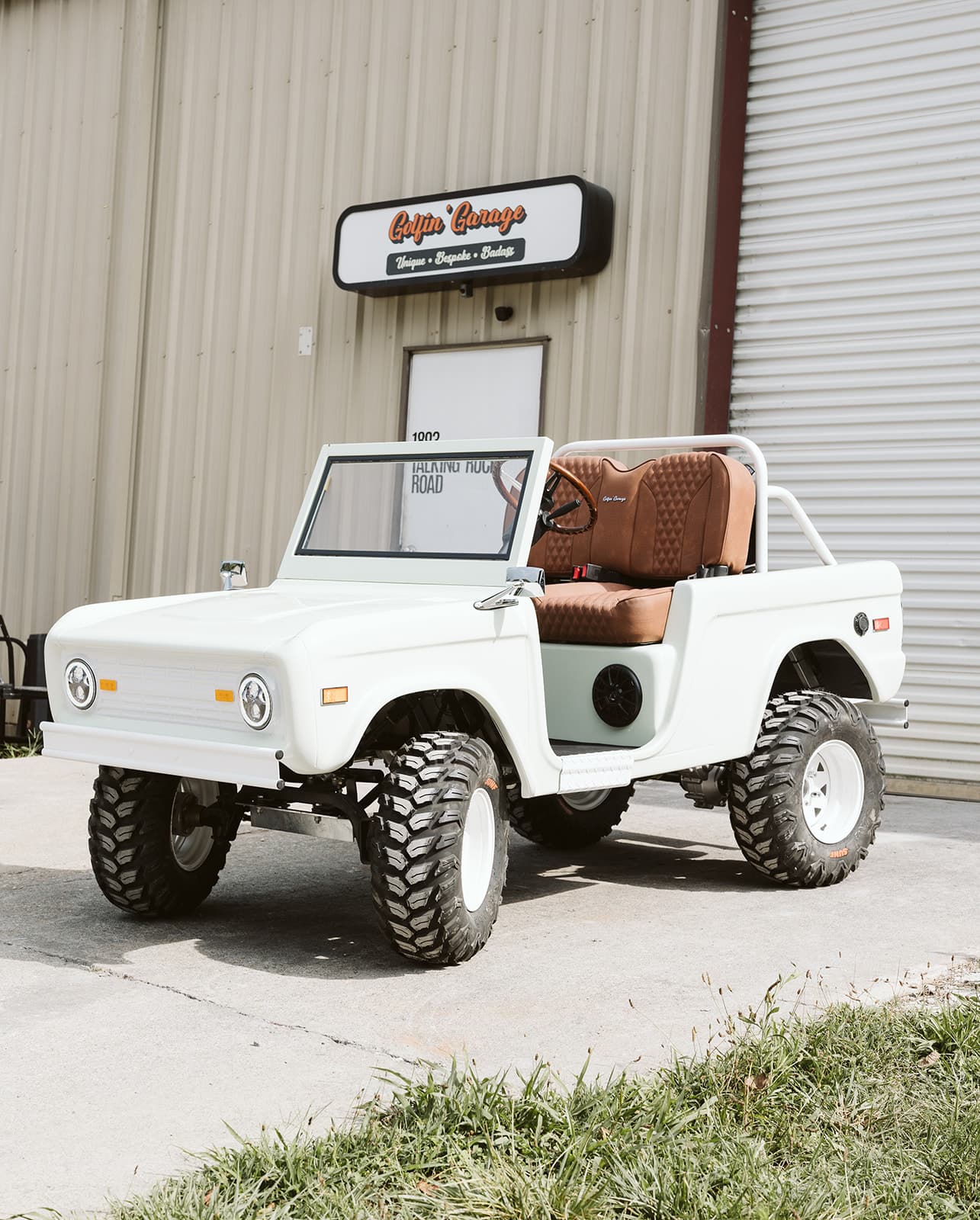 White Out Retro Ride outside the Golfin' Garage shop