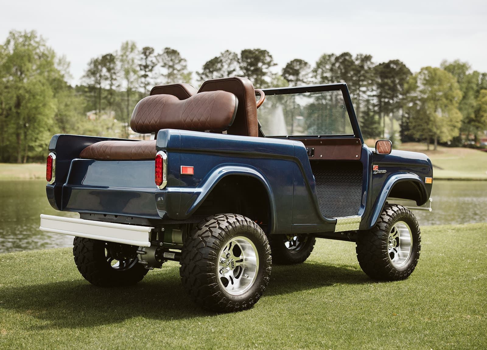 Midnight Blue Poly cart rear 3/4 on course