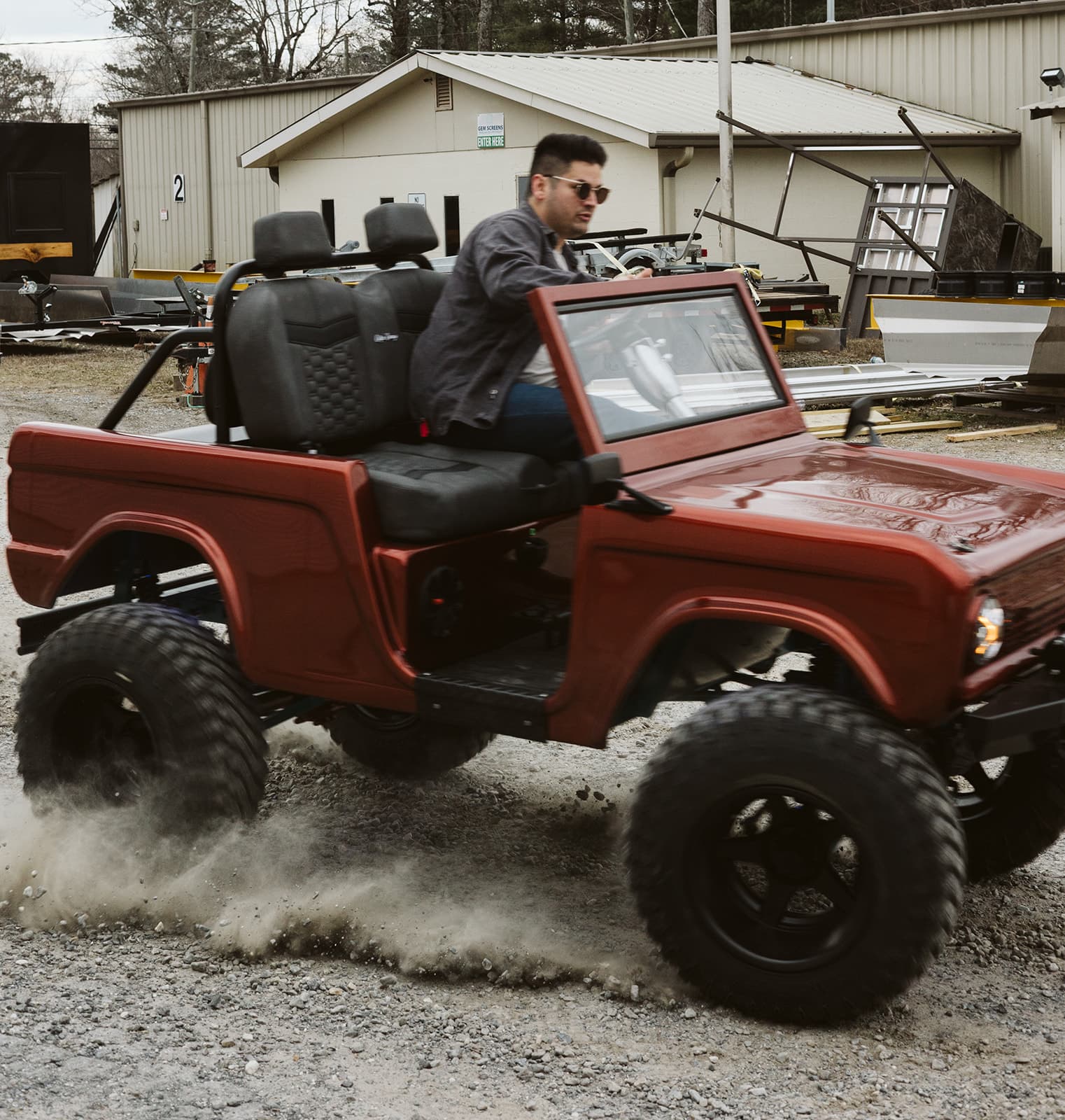 Golfin' Garage Shop Cart kicking up gravel