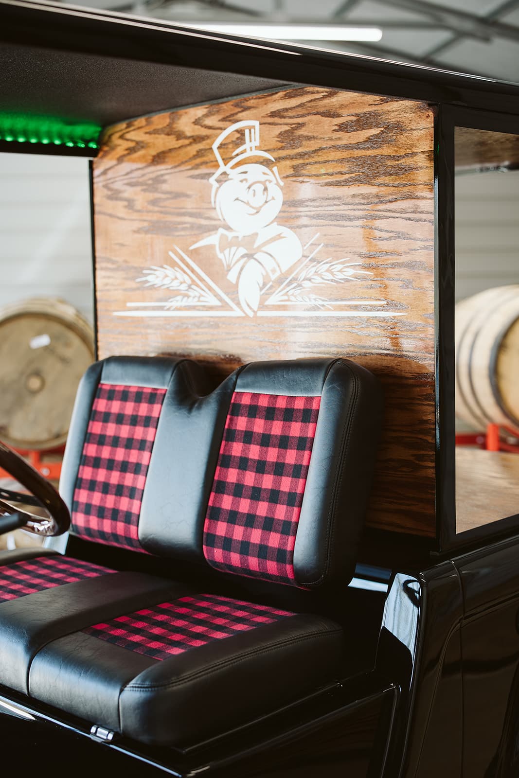 Front 3/4 view with whiskey barrels in background